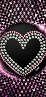 Heart-shaped diamond design with pink accents on black background.