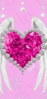 Pink heart with wings and crystals on a pastel pink background.