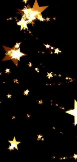 Shimmering golden stars on a black night sky wallpaper.