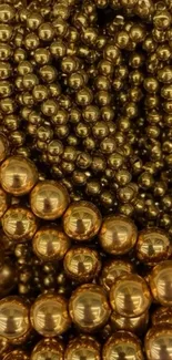 Shiny golden beads create an elegant abstract pattern.