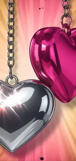 Glossy pink and silver heart-shaped pendants on chains, vibrant background.