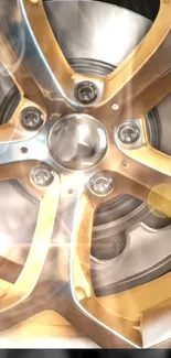 Shiny metallic wheel with golden hues.