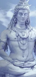 Shiva meditative statue in soft blue tones.