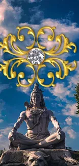 Shiva statue with ornate design under a vibrant blue sky.