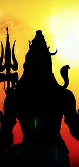 Silhouette of Lord Shiva against an orange sunset background.