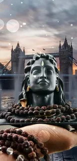 Shiva statue in hand before iconic tower bridge at sunset.