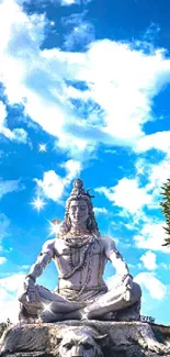 Majestic Shiva statue under vibrant blue skies.