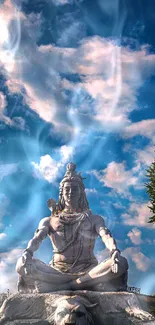 Serene Shiva statue under a majestic cloudy sky for mobile wallpaper.