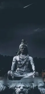 Lord Shiva meditating under a starry sky.