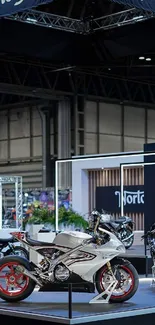 Motorcycles displayed in a well-lit showroom with Norton branding.