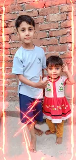 Siblings pose joyfully against a rustic brick wall highlighted by dynamic light effects.