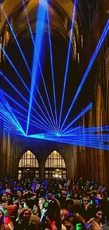 Silent disco with blue laser lights in a cathedral setting.