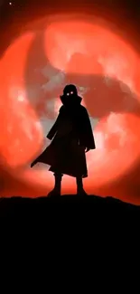 Silhouette standing against a red moon.