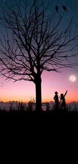 Silhouette of a tree and figures against a twilight sky with moon.