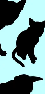 Silhouette of cats on a light blue background for mobile wallpaper.