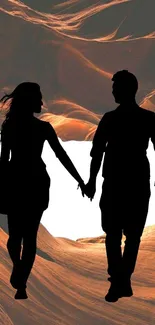 Silhouette of a couple in a canyon background, holding hands under an orange sky.