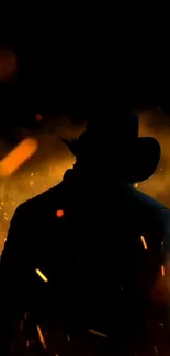 Cowboy silhouette with fiery and dramatic background.