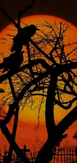 Silhouetted crows on branches with orange moon.