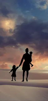 Silhouetted family walks in desert at sunset with dramatic sky.