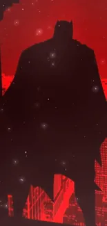 Silhouette of a hero on a red cityscape background.