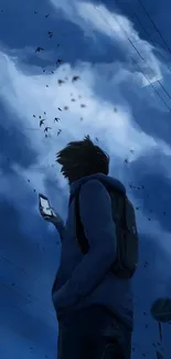 Silhouette holding phone against a blue sky with birds.