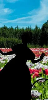 Silhouette in colorful flower field under blue sky with clock.