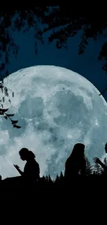 Silhouetted figures under a full moon and starry night sky wallpaper.