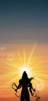 Silhouette of Hindu deity at sunrise with vibrant colors.