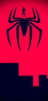 Silhouette of a spider over a red city skyline in a night themed phone wallpaper.