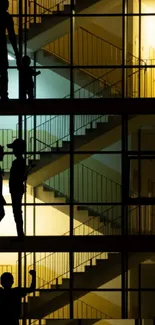 Silhouettes on multi-level stairs with warm yellow lighting.