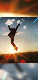 Silhouette jumping joyfully under a sunset sky with vibrant colors and light flares.