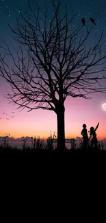 Silhouette of tree and couple under a starry sunset sky.