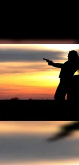 Silhouette of a person at sunset creating a dramatic and captivating scene.