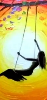 Artistic silhouette on a swing against a bright, colorful sunrise background.