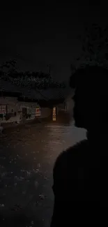 Silhouette in a dark village night scene.