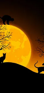 Cat silhouettes under a vivid yellow moon.