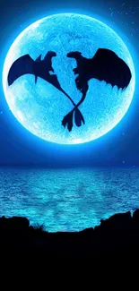 Silhouetted dragons soaring under full moon over the ocean at night.