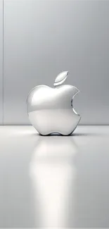 Sleek silver Apple logo wallpaper for mobile.