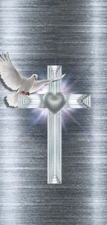 Silver cross with dove and heart on metallic background.