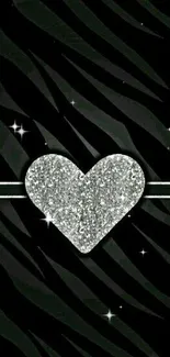 Silver heart on black zebra background wallpaper.