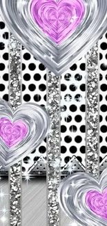 Elegant mobile wallpaper with silver hearts and pink centers.