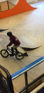 BMX rider performing stunts in a skate park with ramps and vibrant colors.