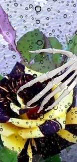 Skeleton hand on a vibrant multicolored flower backdrop.