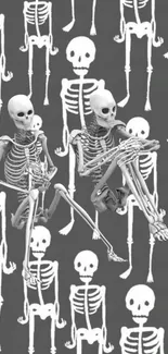 Wallpaper with white skeletons on gray background in a pattern.