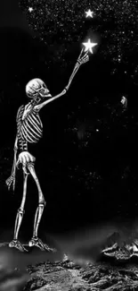 Skeleton reaching for stars in a black and white cosmic scene wallpaper.