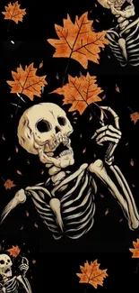 Skeleton holding autumn leaves on a dark background wallpaper.