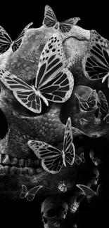 Black skull with butterflies art on mobile wallpaper.