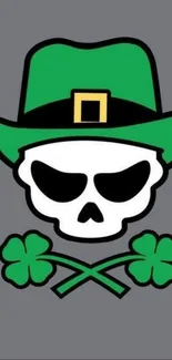 Skull with green leprechaun hat and clovers on gray background.