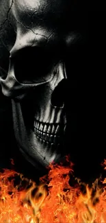 Dark skull with fiery flames wallpaper for mobile.