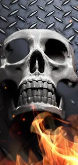 Metallic skull with flames on dark textured background wallpaper.